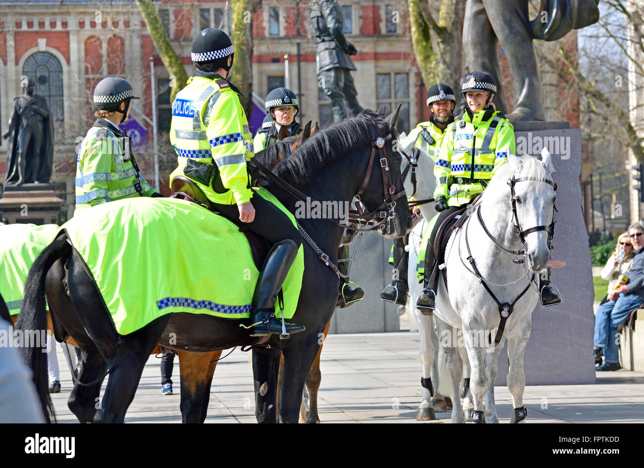 London, England, UK. Mounted police officers in Parliament Square