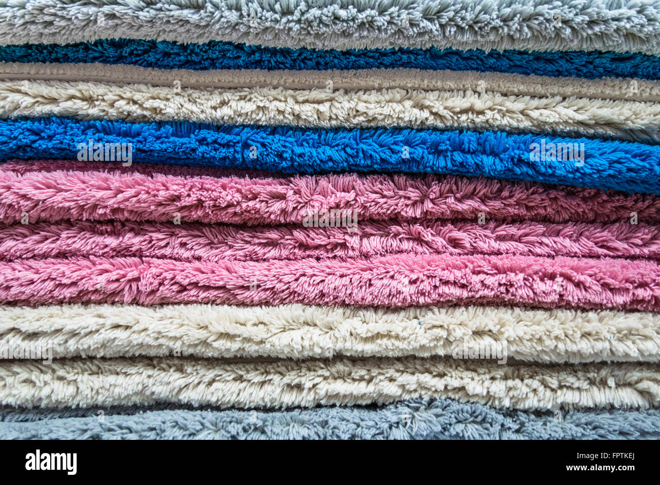 Detail of colored weft of a woolen carpet. Stock Photo