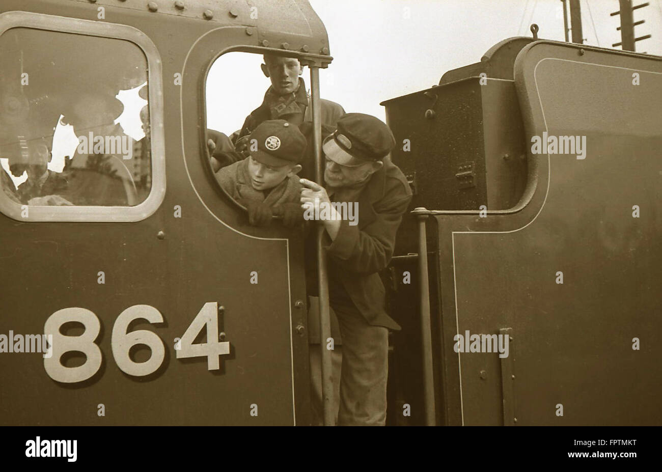 A schoolboy trainspotter in the cab of Southern Railway Lord Nelson ...