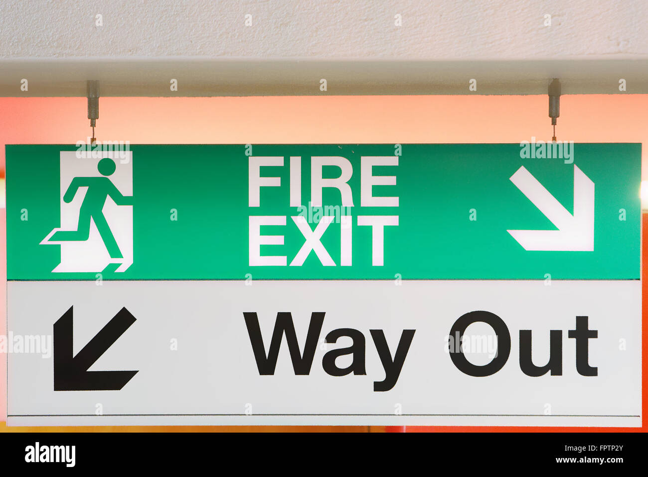 Emergency fire signboard and way out Stock Photo