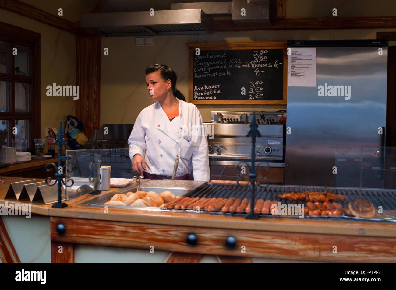 WURST, SAUSAGES AND BEER IN A BIERGARTEN, TIERGARTEN, BERLIN, GERMANY. Beer gardens are most common in Munich, where you can vis Stock Photo