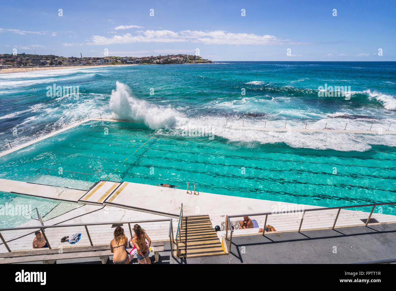 waves crashing into the swimming pool of the Bondi Icebergs Swimming Club, Bondi Beach, Sydney Eastern Suburbs Stock Photo