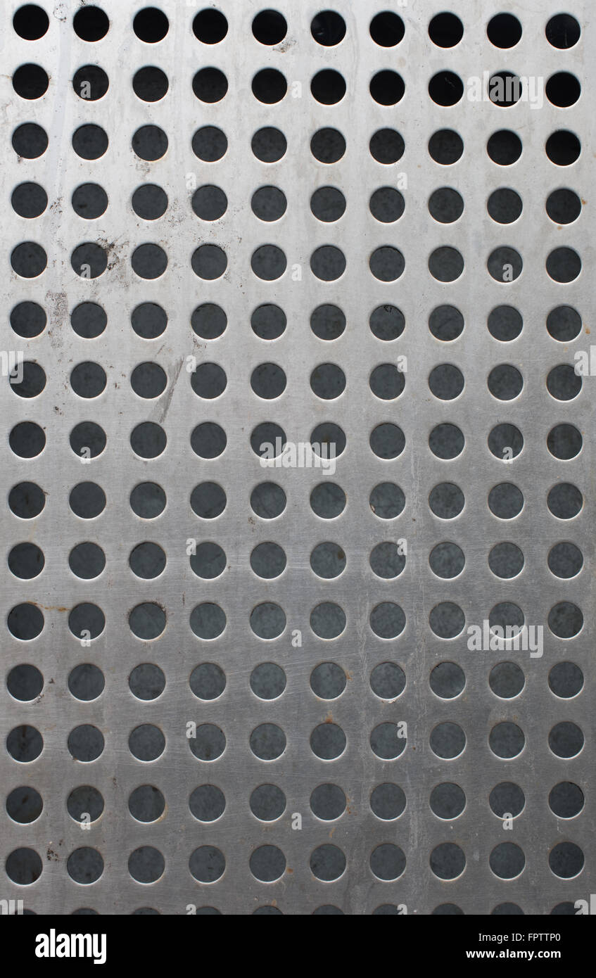 Metal background with holes Stock Photo
