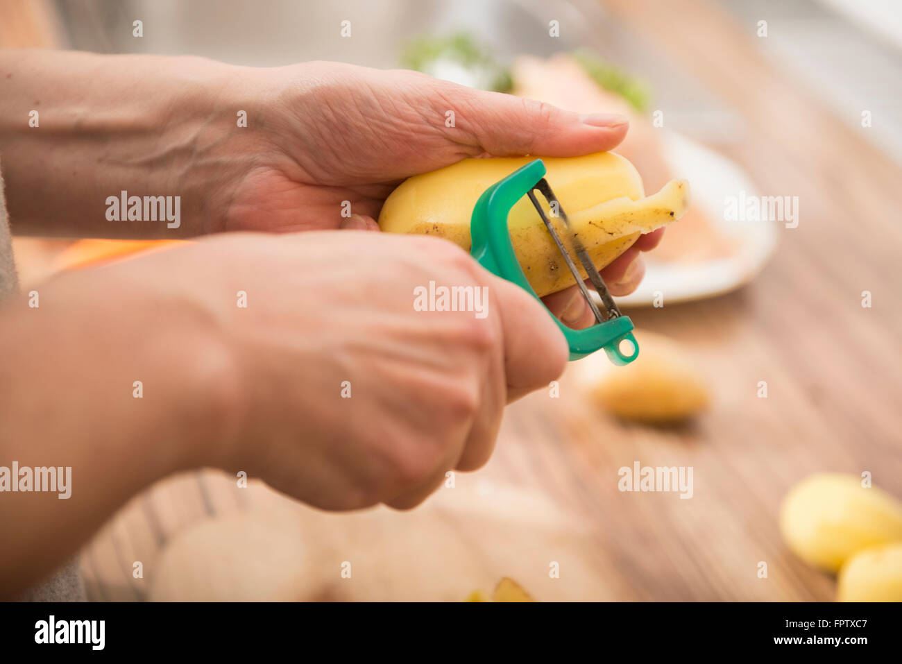 Food Drink Hand Holding Potato Peeler Stock Photo - Download Image Now -  Australia, Drinking, Eating - iStock