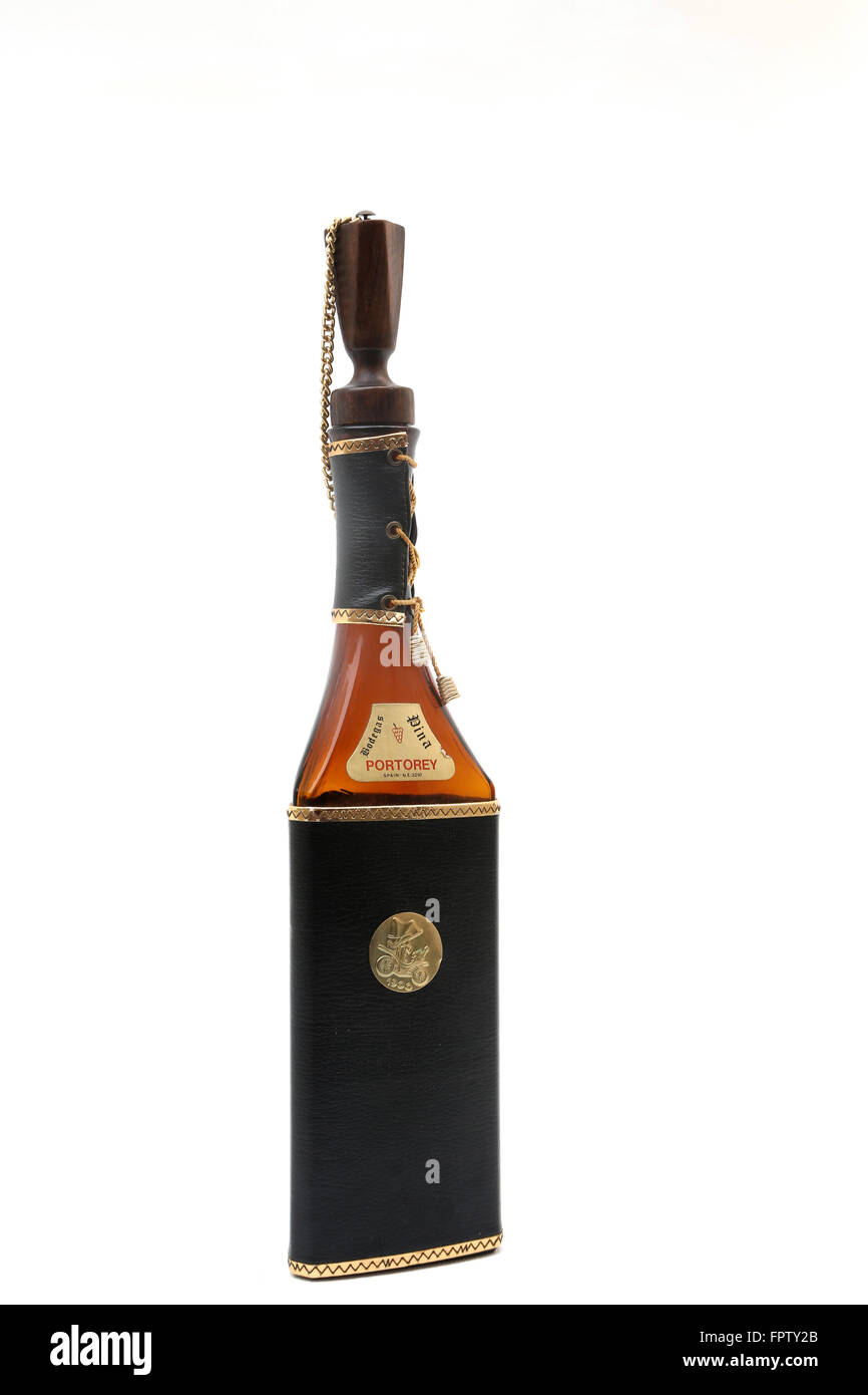 Triangular Bottle Of Spanish Wine Bodegas Pina Portorey With Leather Cover And Chain Attached To Cork Stock Photo