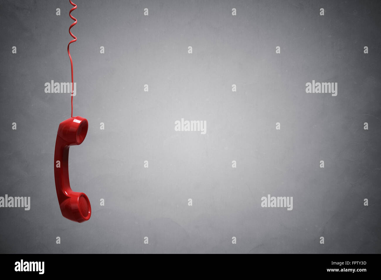 Red telephone receiver with copy space Stock Photo