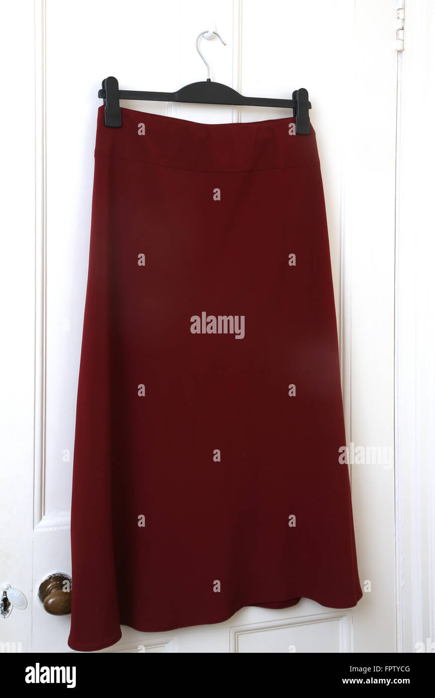 Long Maroon Crepe A Line Skirt Hanging On Door Stock Photo Alamy