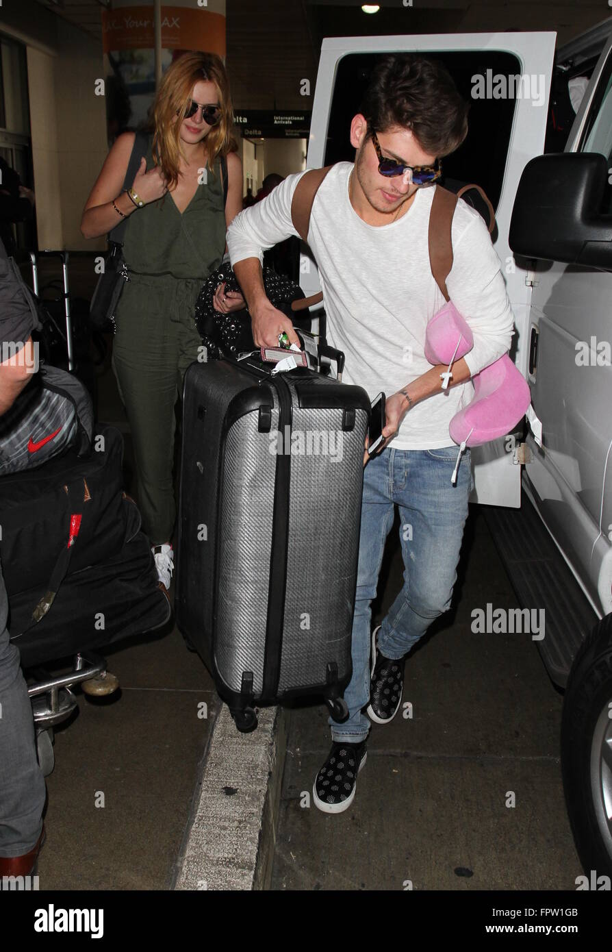 Bella Thorne arrives on a flight to Los Angeles International Airport