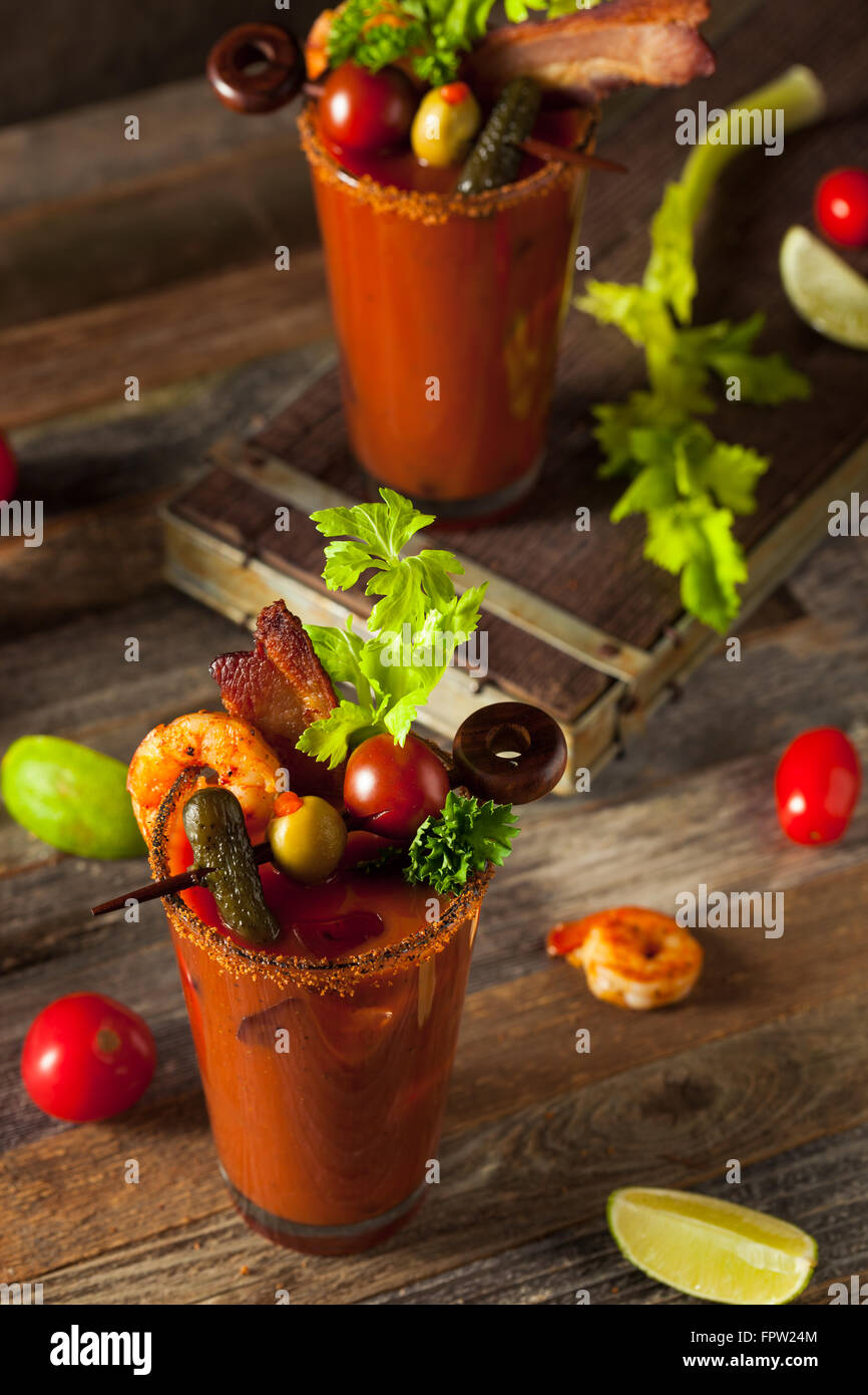 Homemade Bacon Spicy Vodka Bloody Mary with Tomatos, Olive and Celery ...