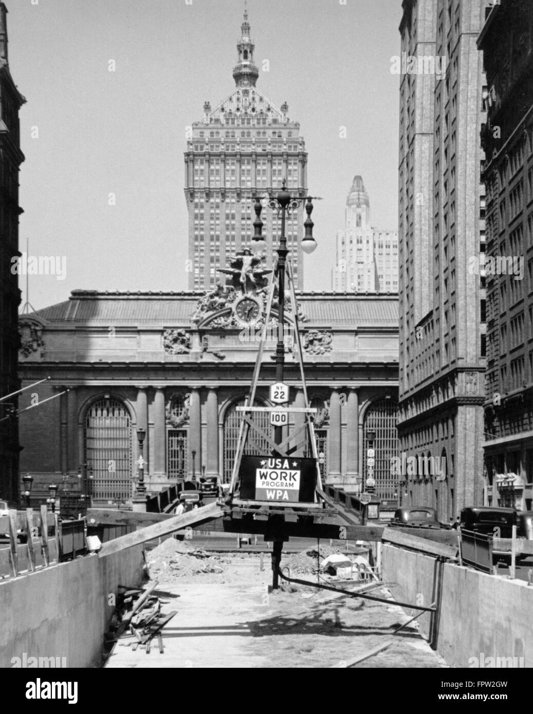 1930s STREET CONSTRUCTION IN FRONT OF GRAND CENTRAL STATION WITH SIGN WPA DEPRESSION AGENCY NEW YORK CITY USA Stock Photo