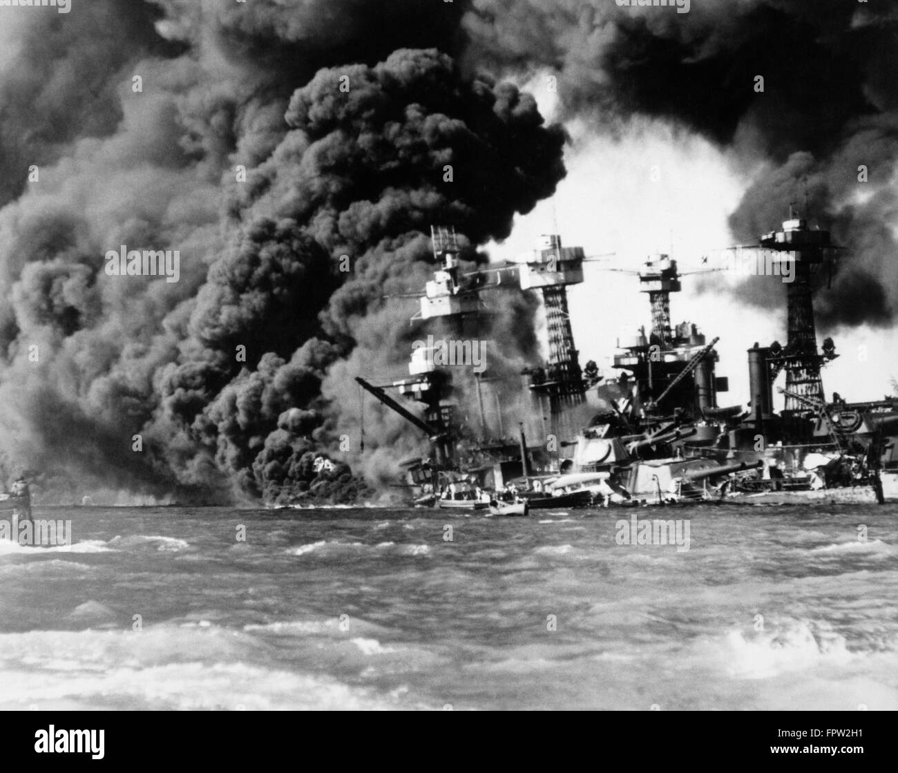 1940s DECEMBER 7 1941 BURNING NAVY SHIPS IN PEARL HARBOR AFTER SURPRISE ATTACK BY JAPANESE Stock Photo
