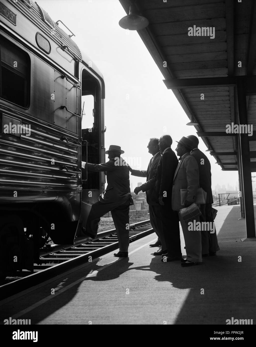 1960s MORNING BUSINESS COMMUTERS MEN BOARDING TRAIN CAMDEN NEW JERSEY USA Stock Photo