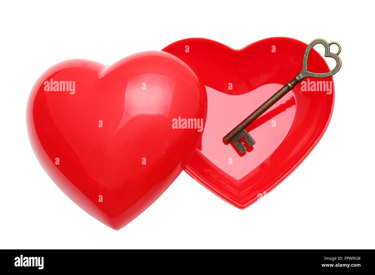 vintage key and red heart on white background Stock Photo - Alamy