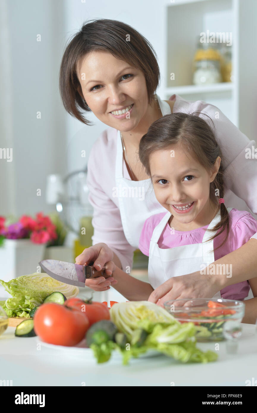 girl and mother prepare food Stock Photo - Alamy