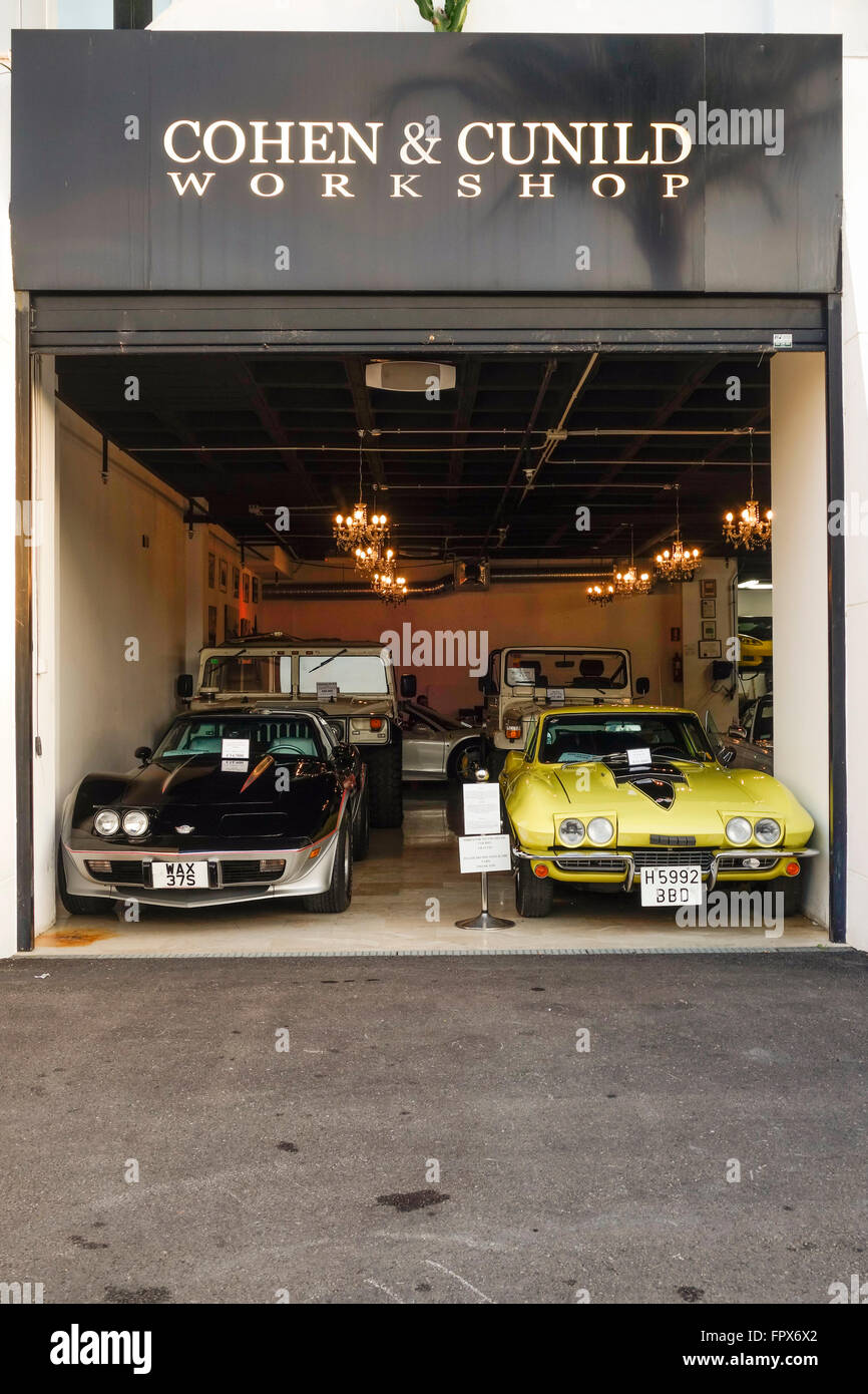 Corvette C2 and Corvette C3, parked in workshop of high end Garage Cohen & Cunild, Puerto banus, Marbella, Spain. Stock Photo