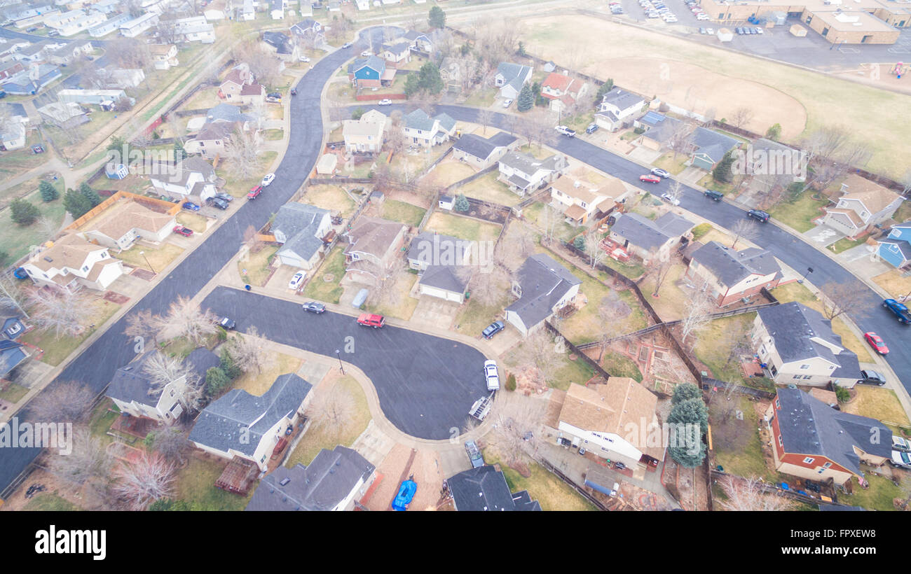 Aerial view of residential neighborhood at the beginning of snow storm. Stock Photo