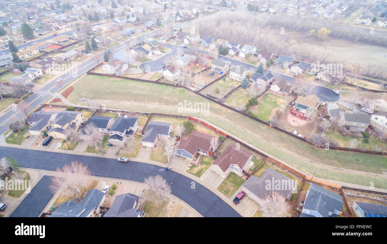 Aerial view of residential neighborhood at the beginning of snow storm. Stock Photo