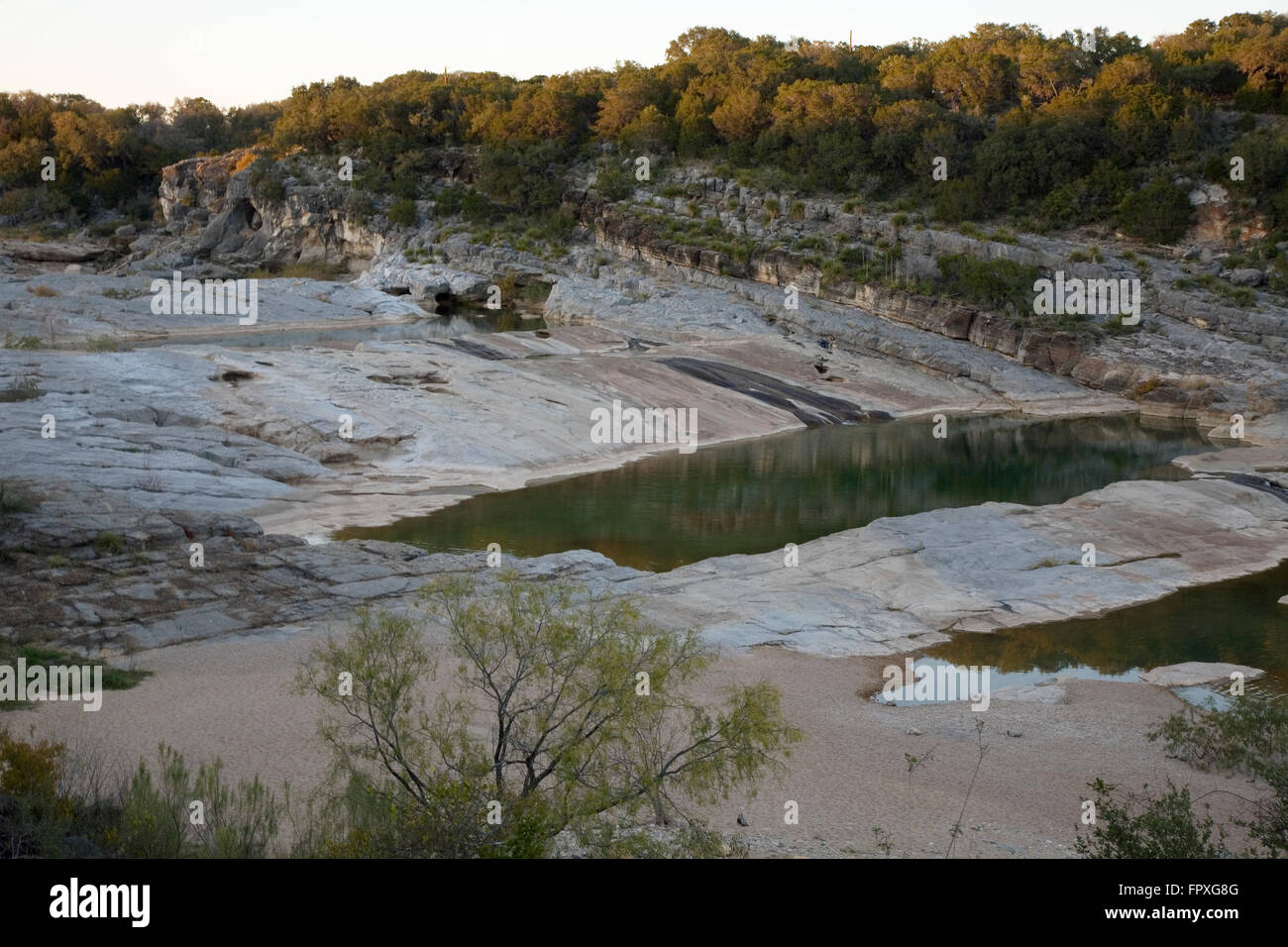 Visitors enjoy the scenic Hill Country setting of Pedernales Falls