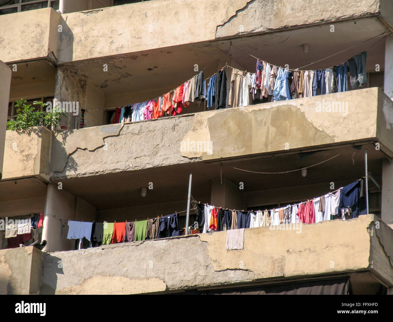 Clothes hanging on clothes lines on balconies Stock Photo Alamy