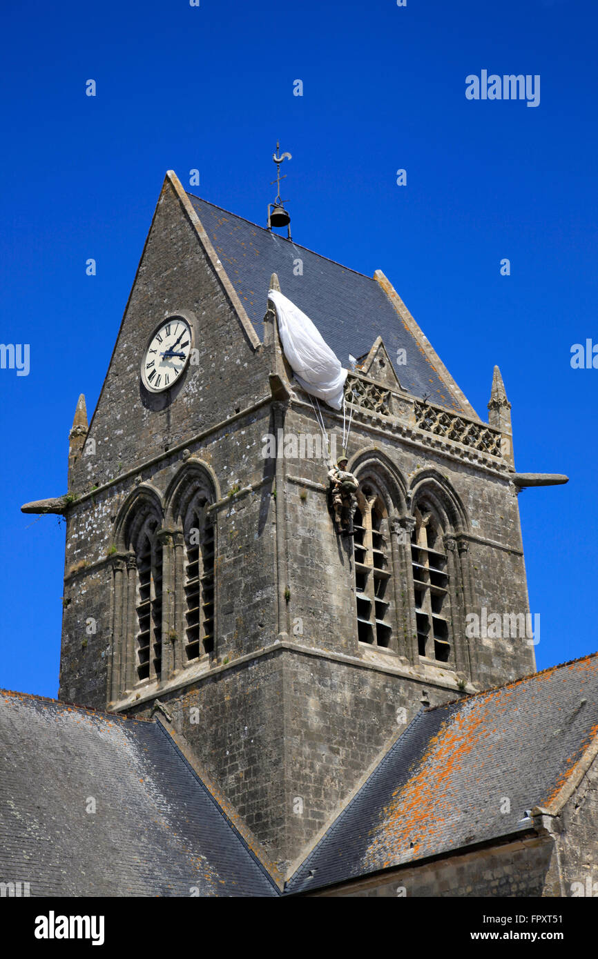 Parachute memorial on tower of church, SainteMereEglise, Normandy