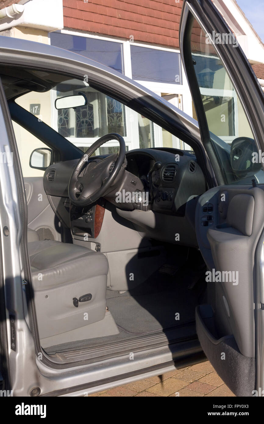 Driver's door of Chrysler grand voyager with leather seats Stock Photo