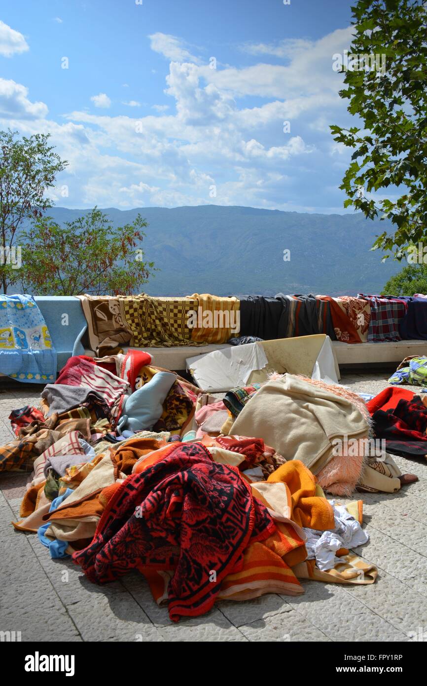 blankets and bedding for hire airing in the sunshine for the  pilgrims and visitors Ostrog Monastery in Montenegros mountains Stock Photo