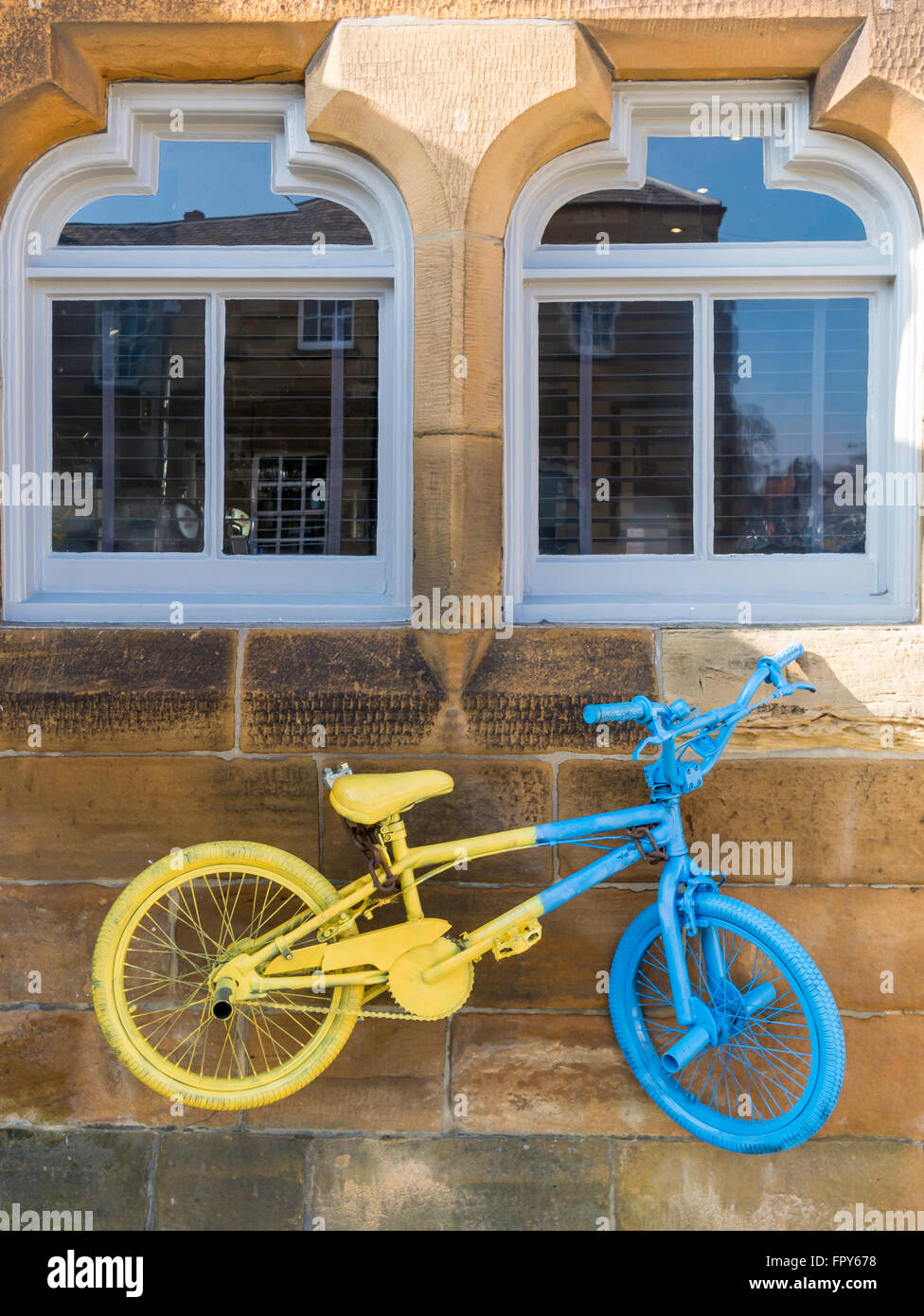 Tour de  Yorkshire cycle race 2016 promoted using yellow and blue painted bicycles here at Stokesley North Yorkshire Stock Photo