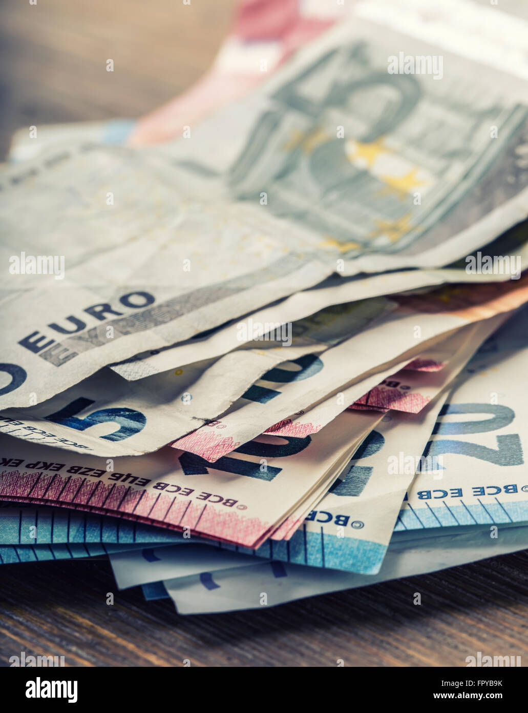 Several hundred euro banknotes stacked by value. Euro money concept. Euro banknotes. Euro currency. Stock Photo