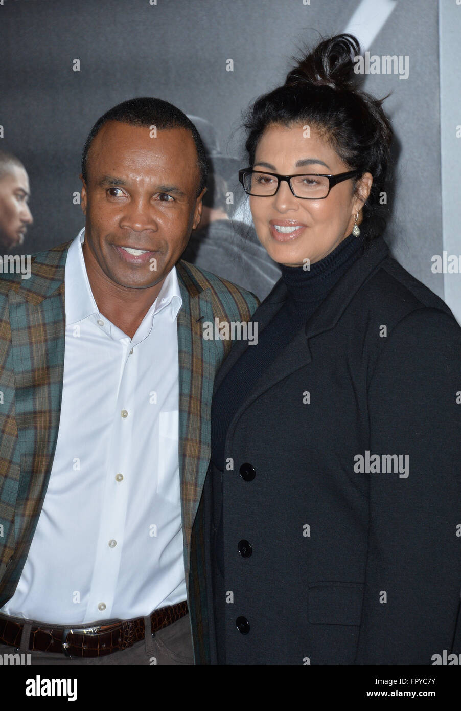 LOS ANGELES, CA - NOVEMBER 19, 2015: Former boxer Sugar Ray Leonard & wife Bernadette Robi at the Los Angeles World premiere of "Creed" at the Regency Village Theatre, Westwood. Stock Photo