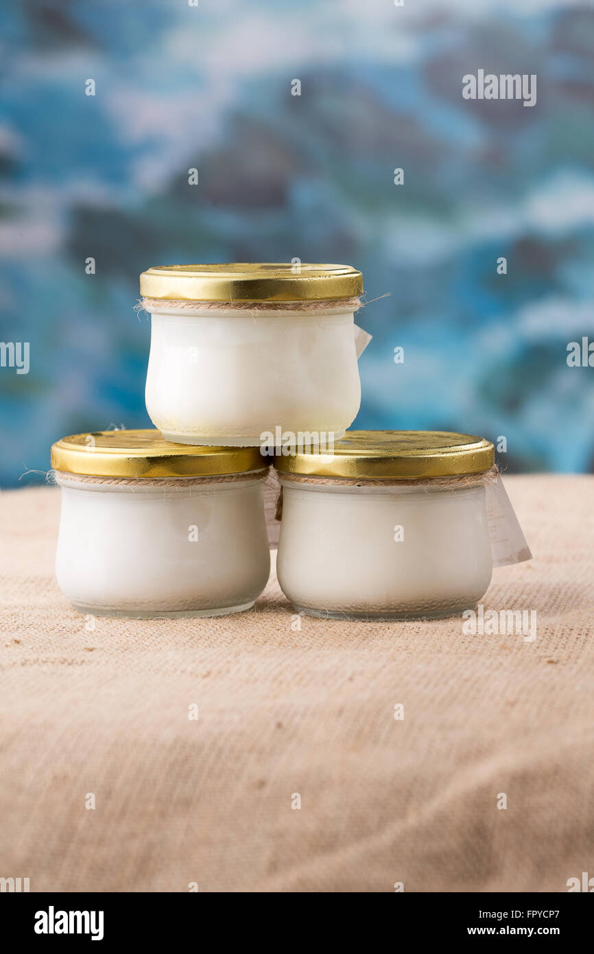 Three jars of fresh natural yogurt Stock Photo Alamy