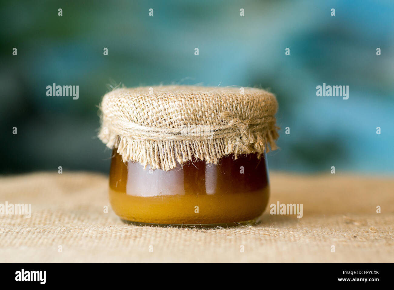 Glass honey jar Stock Photo Alamy