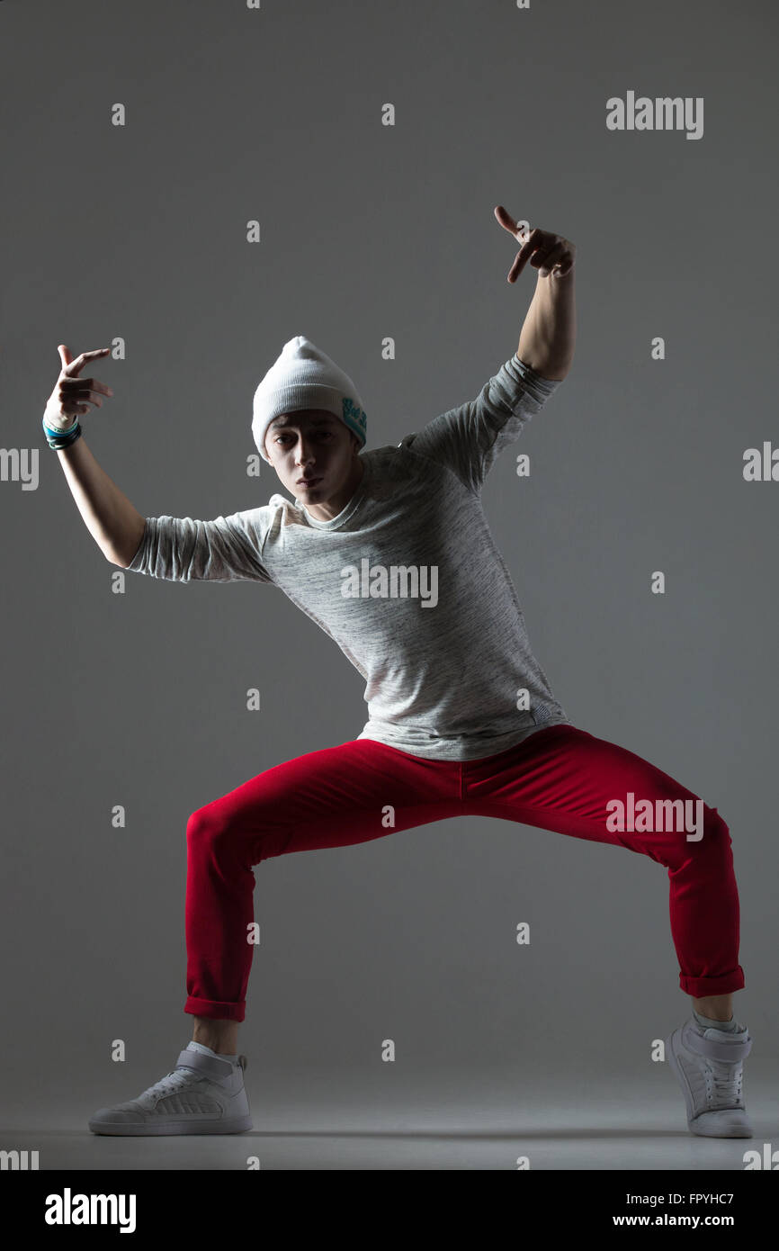 Funny Poses with Two Men Leaning Against a Wall