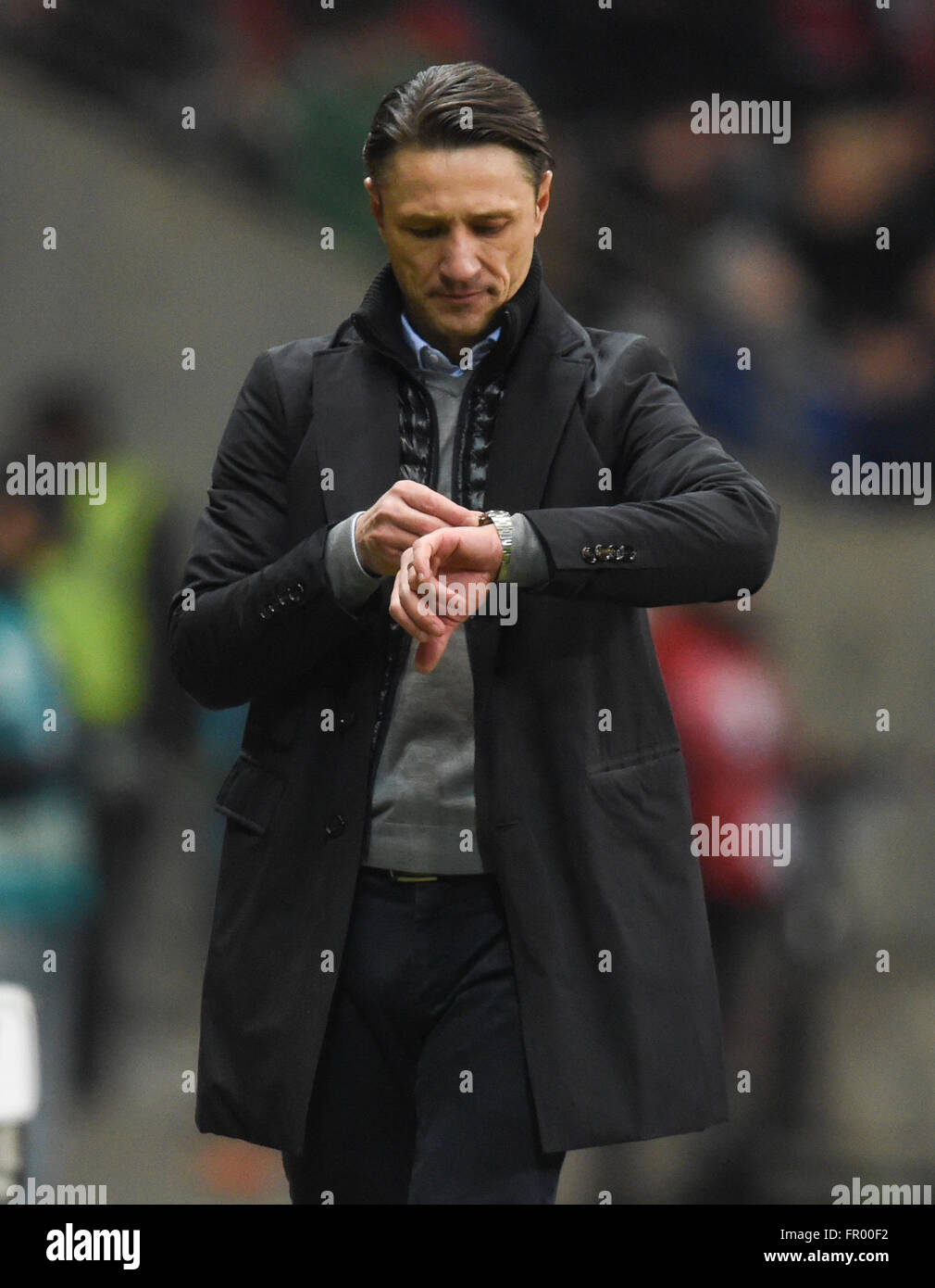 Frankfurt's head coach Niko Kovac looks at his watch during the German  Bundesliga soccer match between