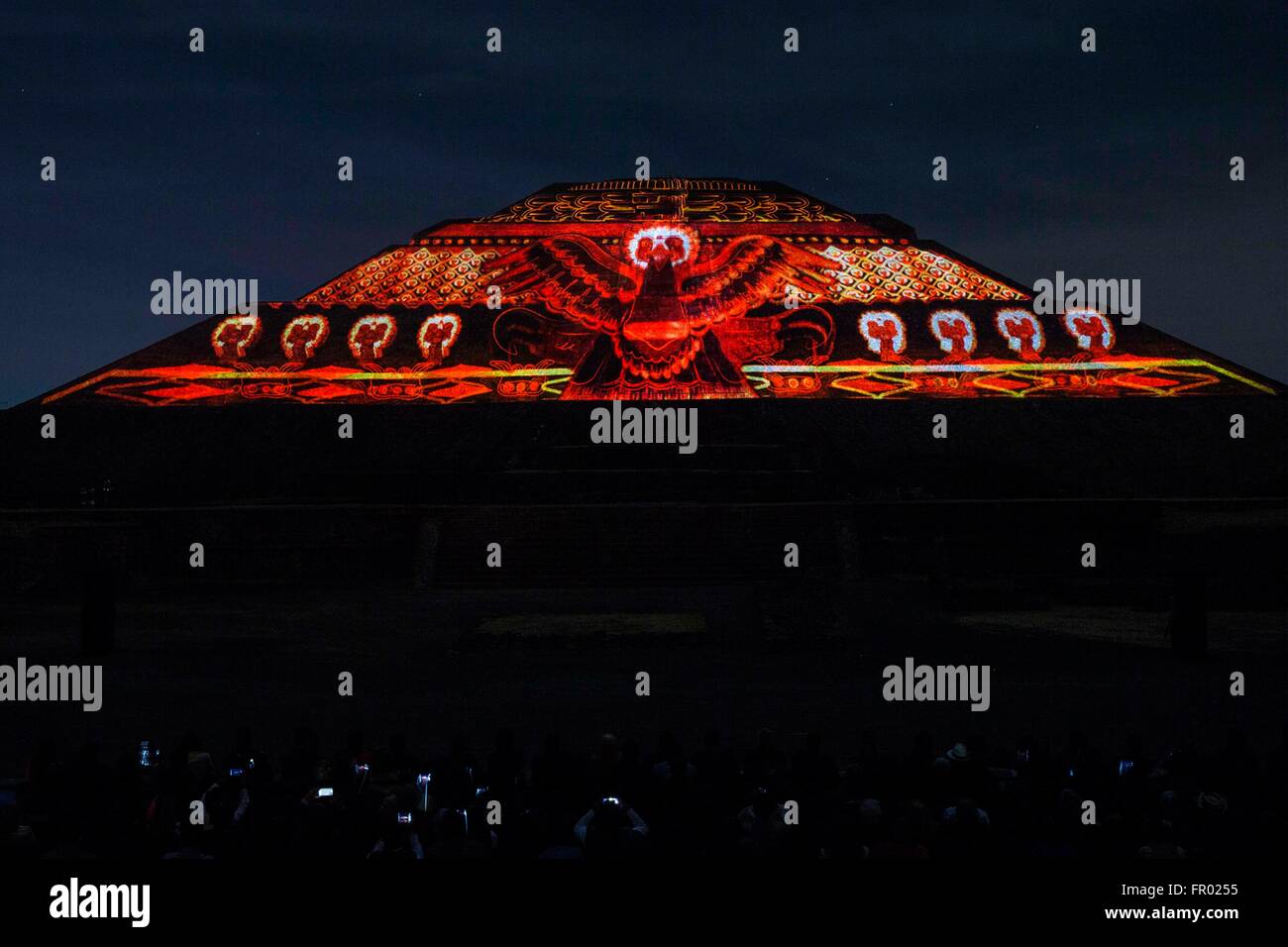Mexico City, Mexico. 20th Mar, 2016. The pyramid of the Sun & Moon at the Teotihuacan archeological site is lit during the first light and sound show ever presented at the World Heritage site known as The City of the Gods March 19, 2016 in Mexico City, Mexico. Mexican President Enrique Pena Nieto inaugurated the event which is expected to attract more visitors to the cultural attraction. Stock Photo