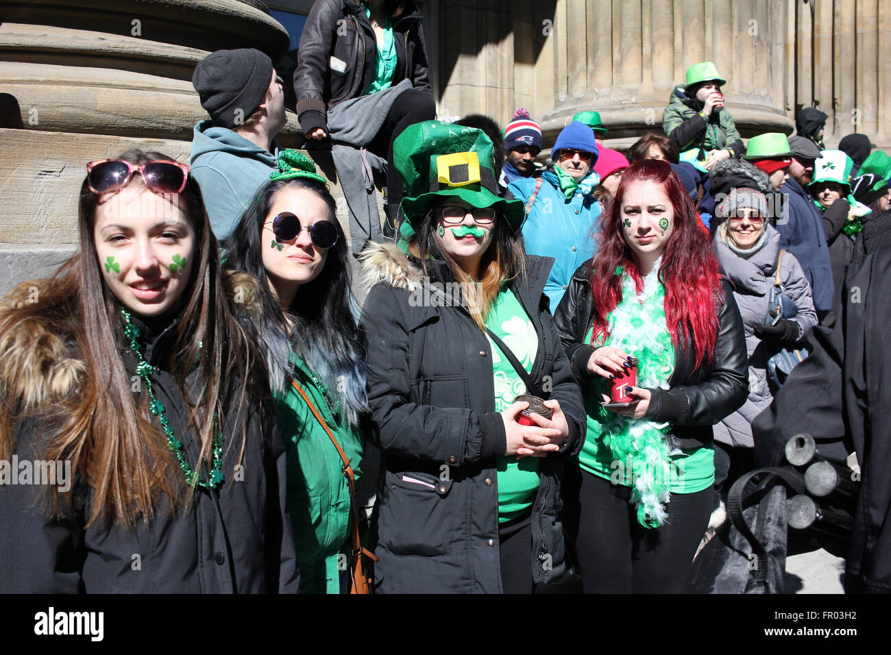 Montreal, Canada. 20th March, 2016. Crowd on the side of the street watching St. Patrick’s Day Parade. Credit:  - Stock Image