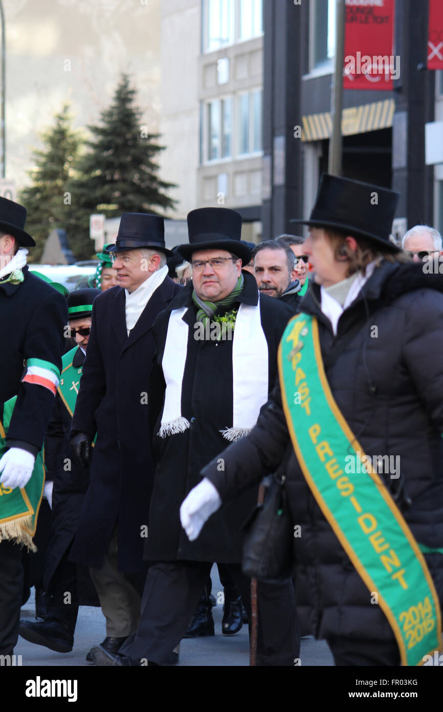 Montreal, Canada. 20th March, 2016. Montreal mayor Denis Coderre (in the middle) walking on St. Patrick’s Day Parade. - Stock Image