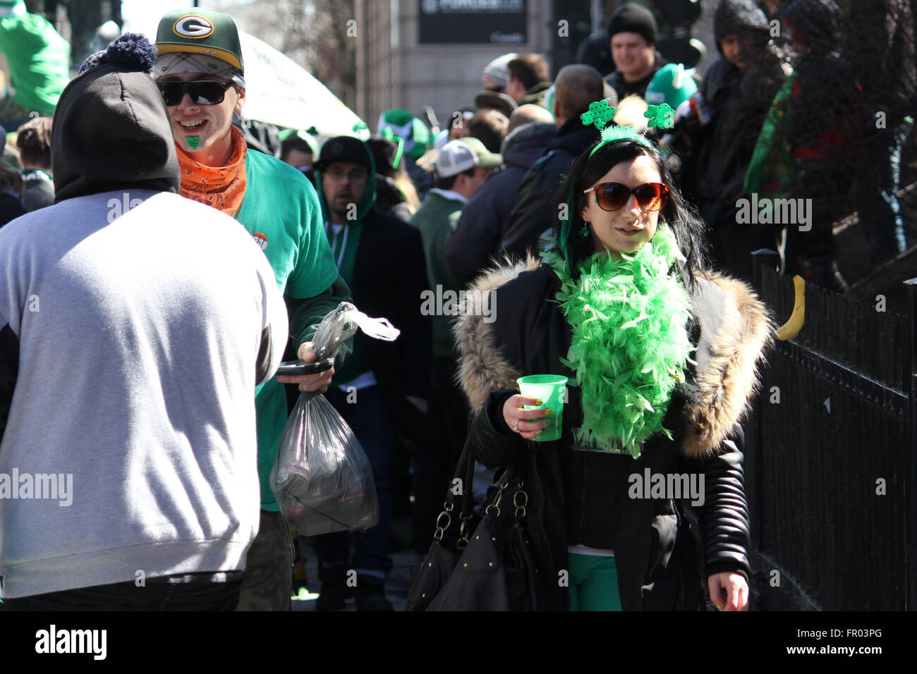 Montreal, Canada. 20th March, 2016. People walking on St. Patrick’s Day. Credit:  Ali Alshammasi/Alamy Live News - Stock Image