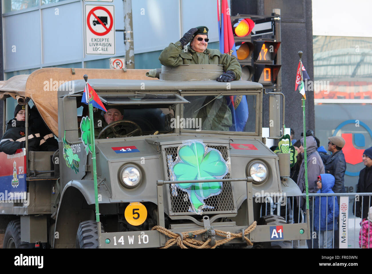 Montreal, Canada. 20th March, 2016. Old military truck in St. Patrick’s Day Parade. Credit:  Ali Alshammasi/Alamy - Stock Image
