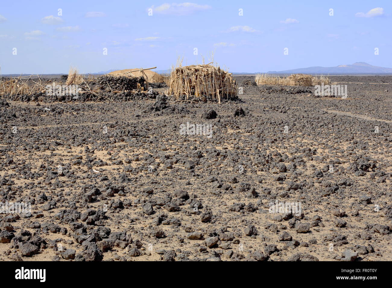Dry barren land of Danakil desert-all tracks erased-way from Afrera town to Dodon-base camp of Erta Ale volcano-Danakil-Ethiopia Stock Photo