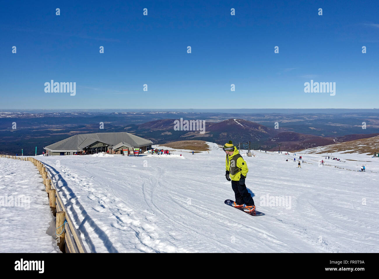 The Top Station of CairnGorm Mountain railway on Cairn Gorm Speyside Scotland with skiers in Sunny weather in early March Stock Photo