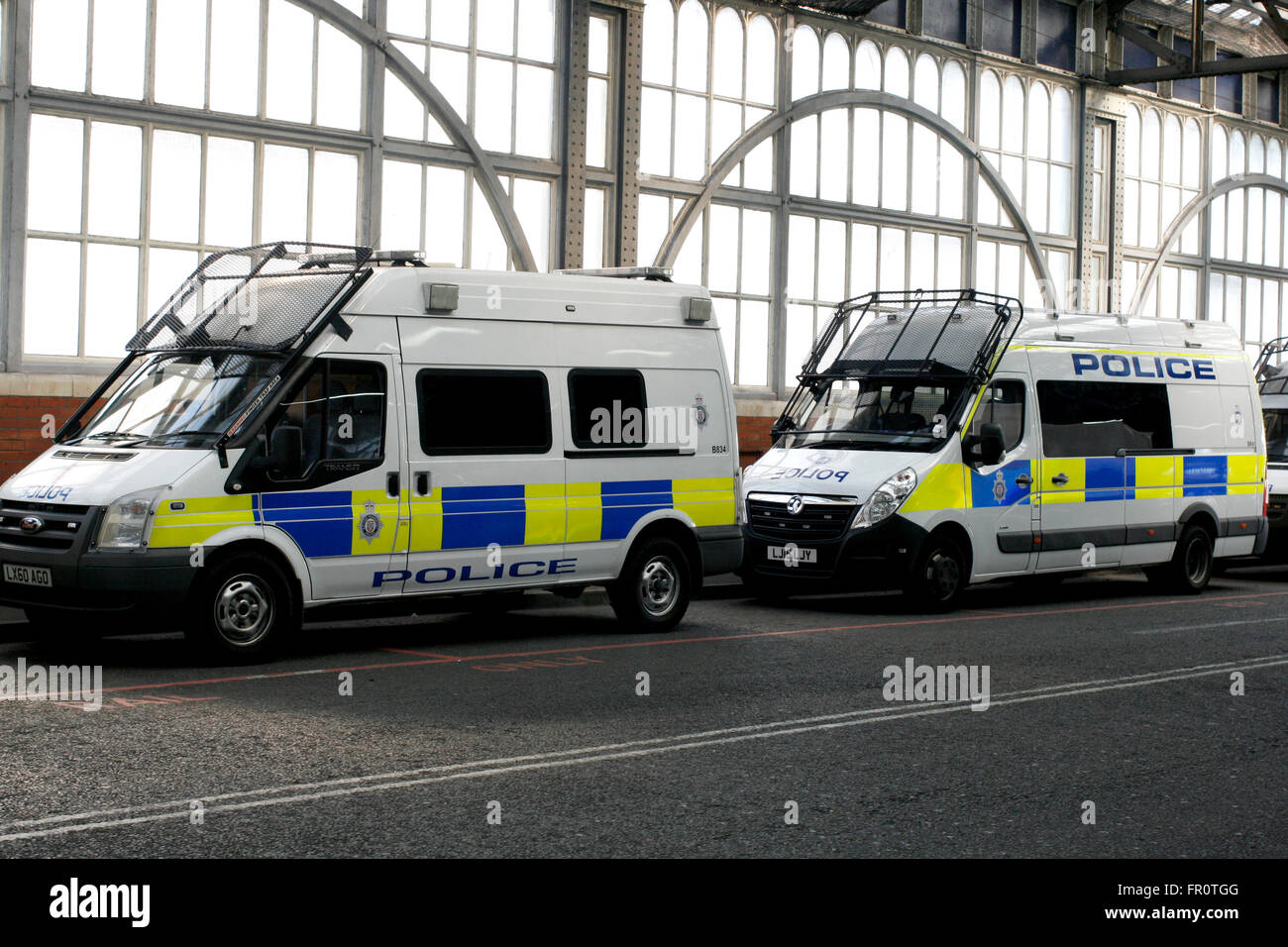 riot shield police vans at london waterloo railway station uk march 2016 Stock Photo