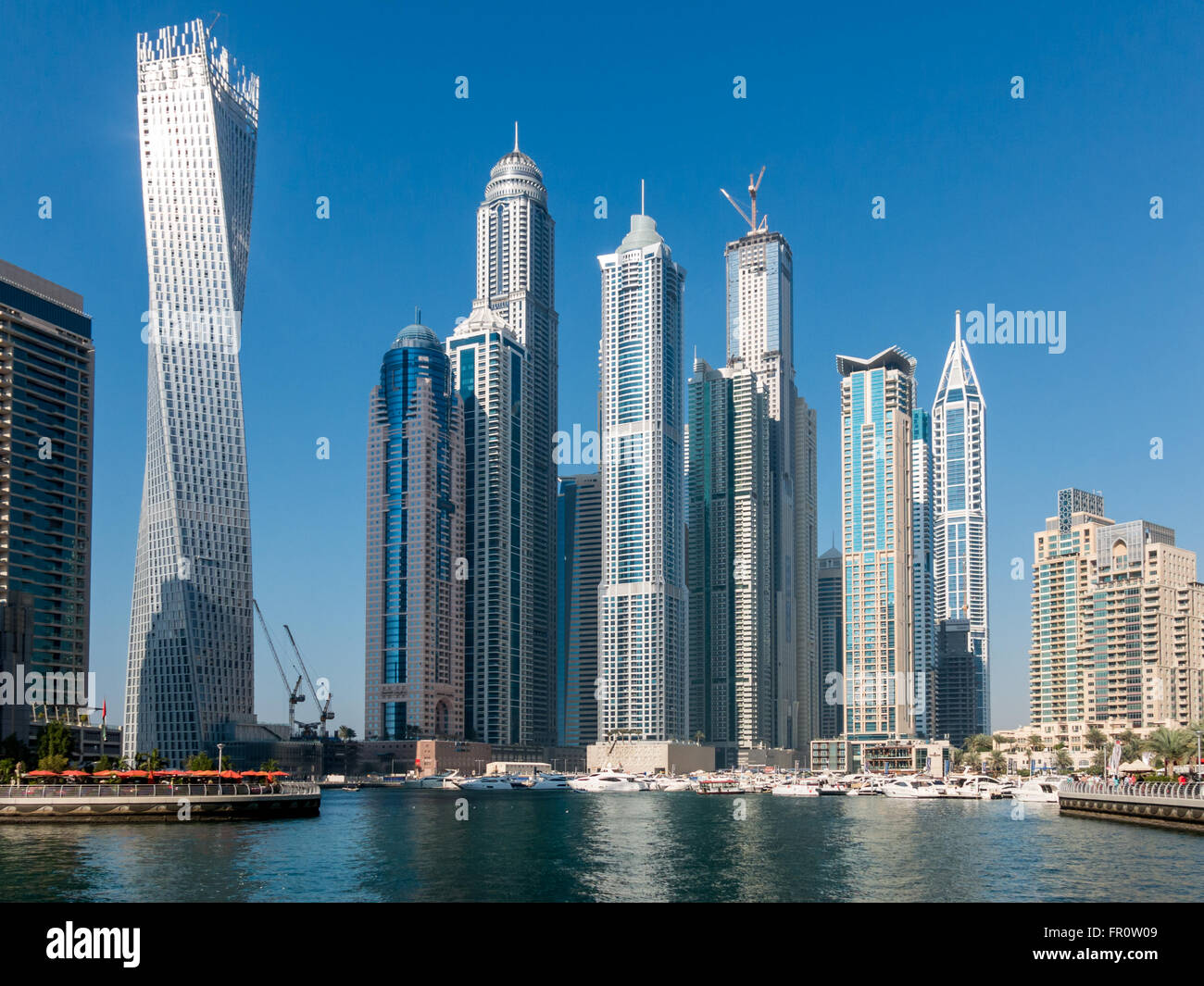 Boats and highrise waterfront buildings in the Marina district of Dubai, United Arab Emirates Stock Photo