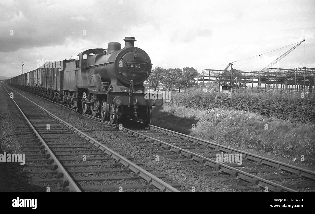 LMS-built No. 605 Fowler 2P 4-4-0 on a freight train Stock Photo