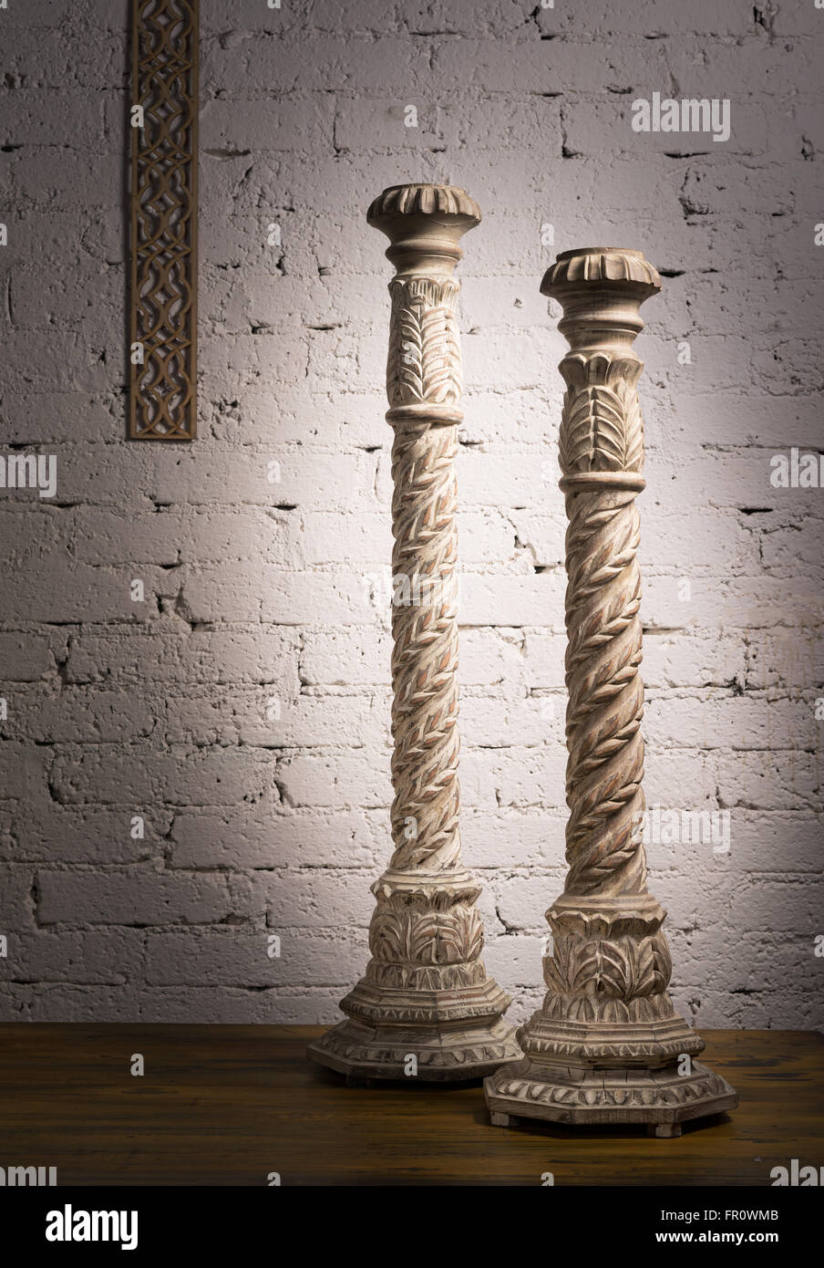Two white vintage wooden ornate candlesticks Stock Photo Alamy