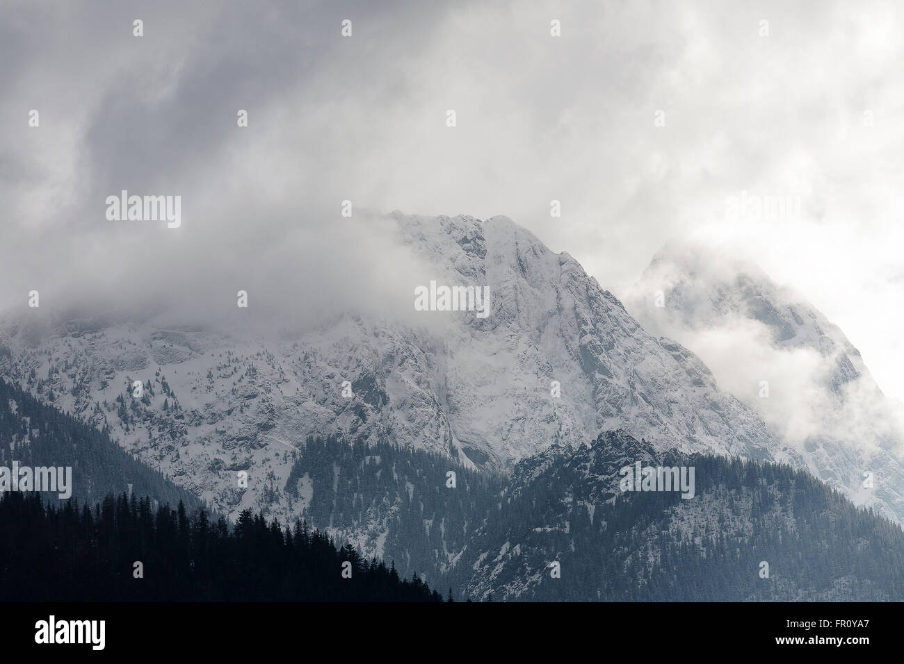 Mountain called Giewont in the clouds Stock Photo