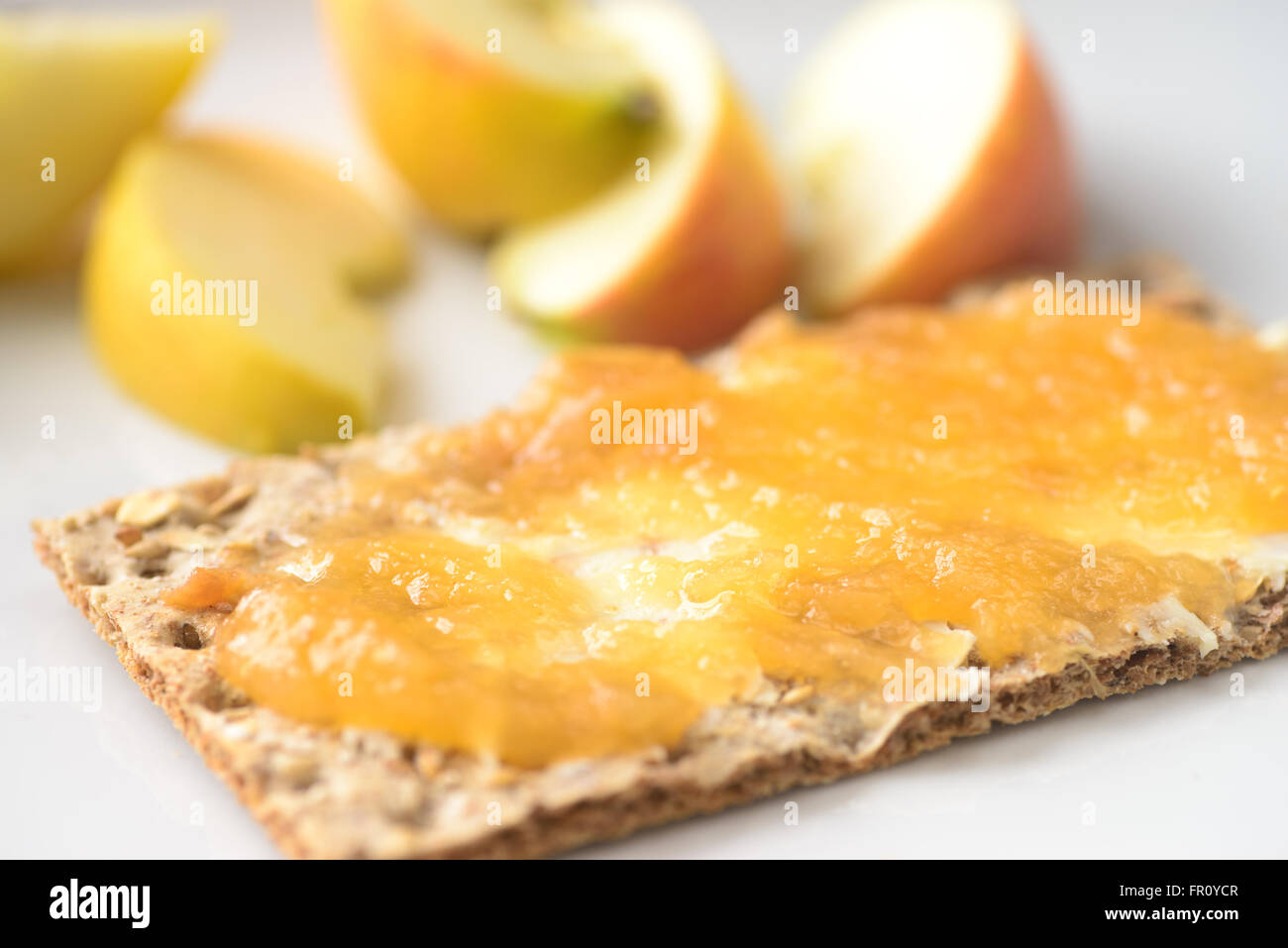 closeup to crispbread with jam Stock Photo