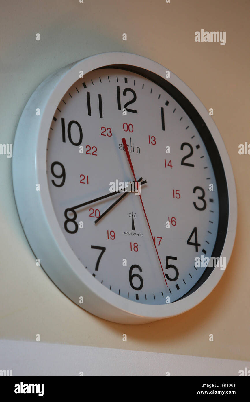 A clock pictured on a wall in a schools cafe in Brighton, East Sussex