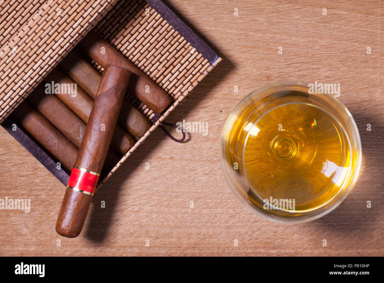 Luxury Cuban cigars on the wooden table Stock Photo