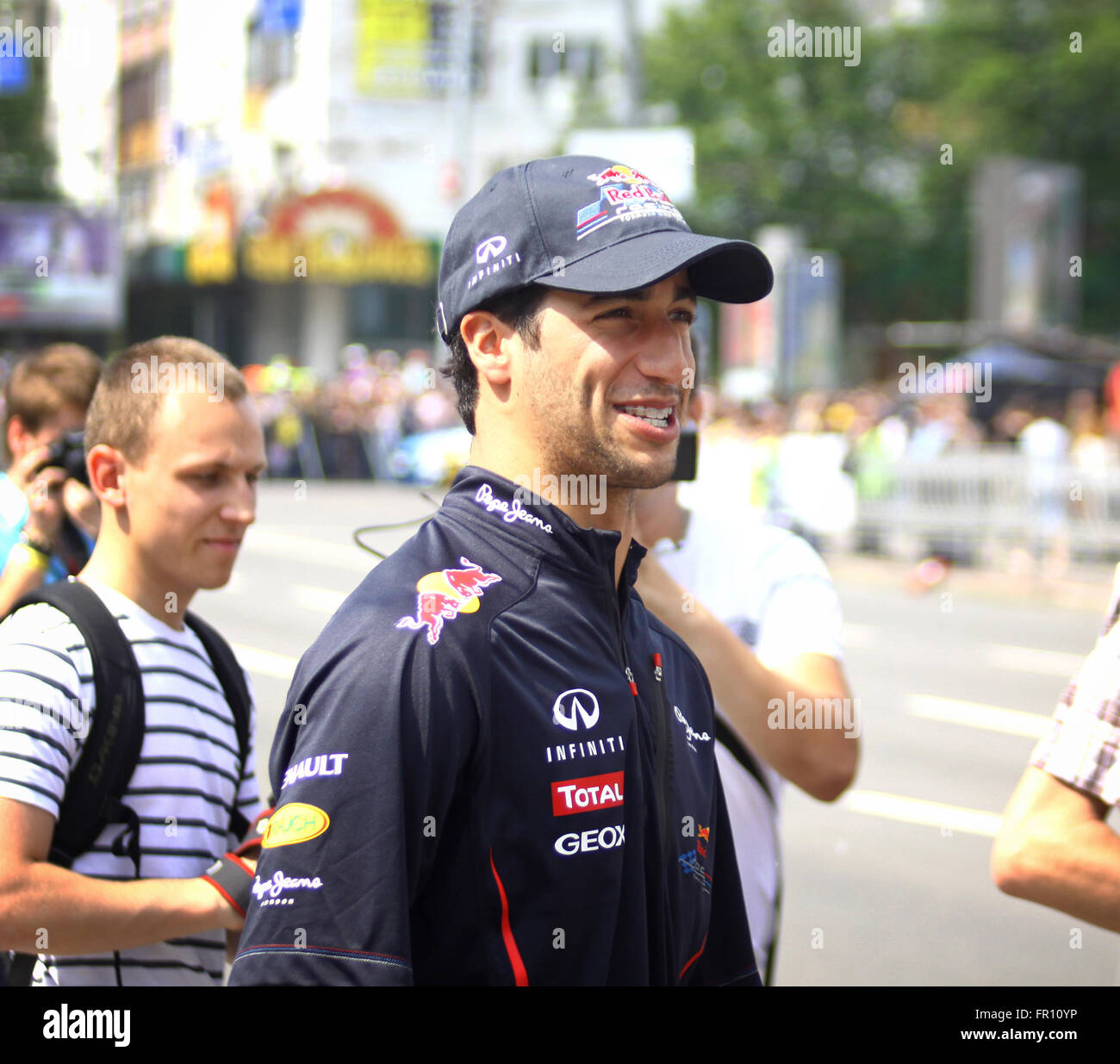 KYIV, UKRAINE - MAY 19, 2012: Driver Daniel Ricciardo of Red Bull Racing Team looks on during Red Bull Champions Parade on the s Stock Photo