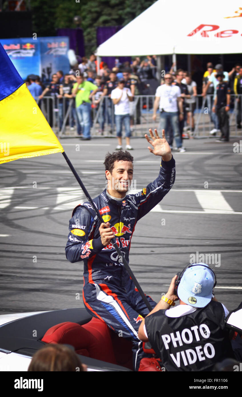 KYIV, UKRAINE - MAY 19, 2012: Driver Daniel Ricciardo of Red Bull Racing Team looks on during Red Bull Champions Parade on the streets of Kyiv city Stock Photo